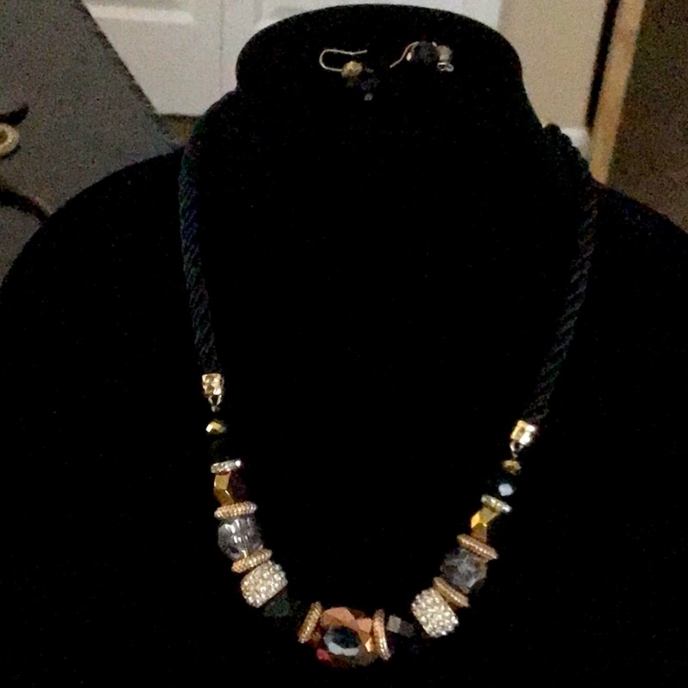Black roped with gold, black beads with metal beads, and Rhinestones